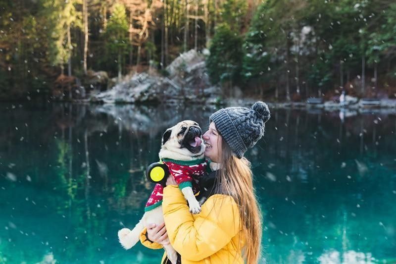 happy woman with pug