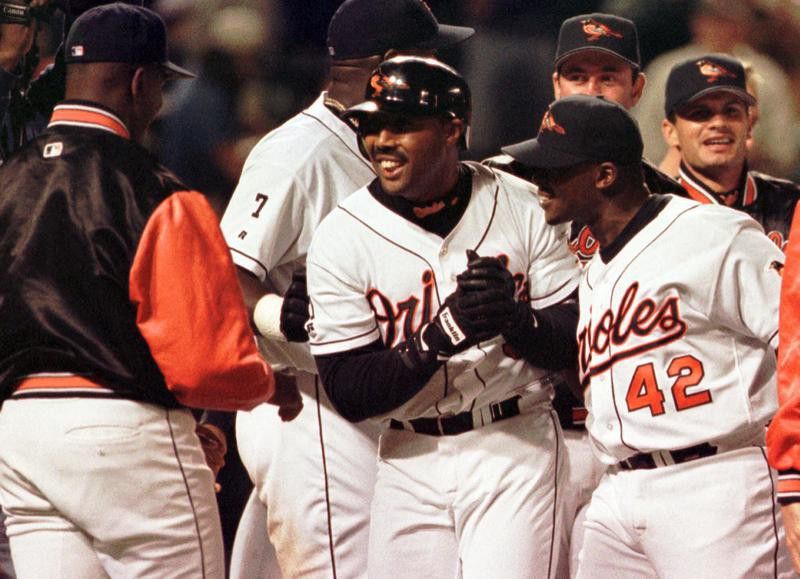 Harold Baines celebrating with Baltimore Orioles teammates