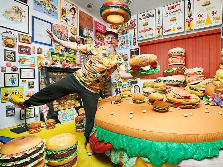 Harry Speri with his collection of hamburger memorabilia