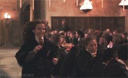 Hermione hugging Harry Potter