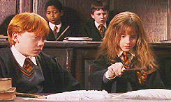 Hermione performing a Harry Potter spell
