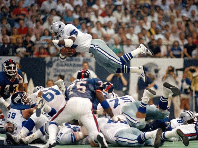 Herschel Walker jumps over the New York Giants line