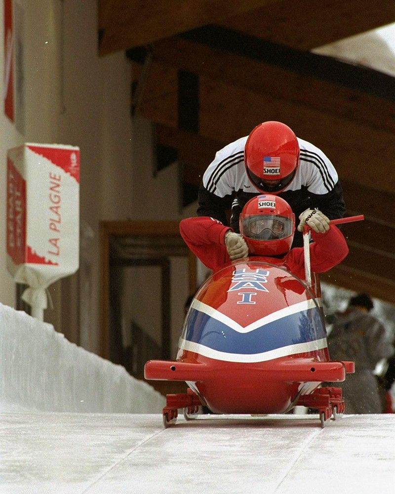 Herschel Walker practicing bobsled at 1992 Winter Olympics