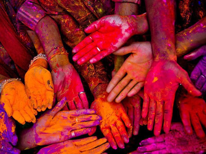 Holi festival in India with colorful hands