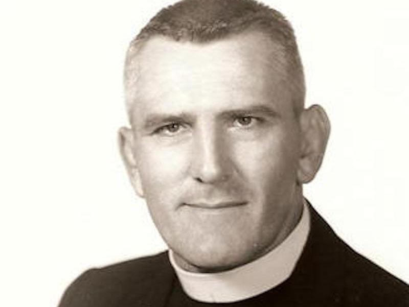 Holy Cross head coach Brother Melchior Polowy