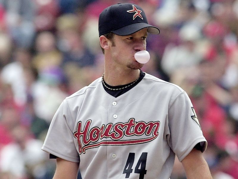 Houston Astros starting pitcher Roy Oswalt blows bubble