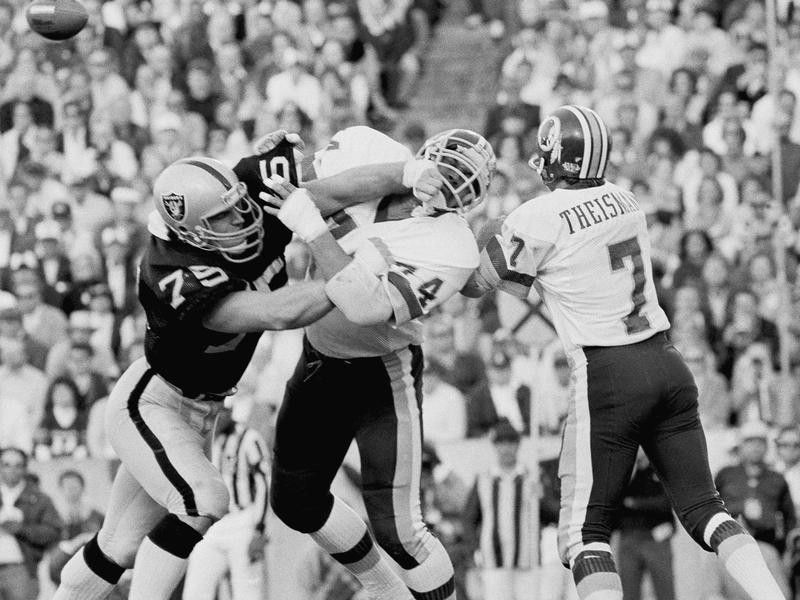 Howie Long battles Washington Redskins during Super Bowl