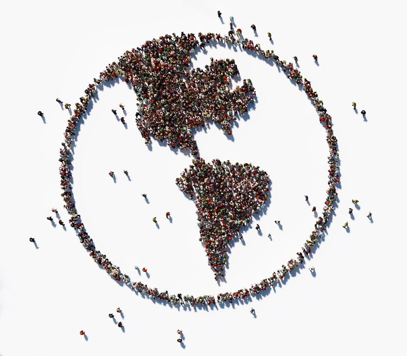 Human crowd forming world symbol