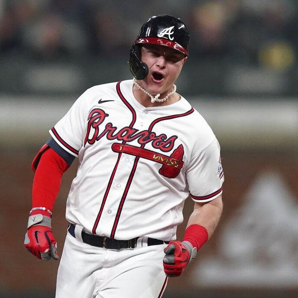 Atlanta Braves' Joc Pederson celebrates after hitting a two-run home run during the fourth inning in Game 2 of baseball's National League Championship Series against the Los Angeles Dodgers Sunday, Oct. 17, 2021, in Atlanta. (AP Photo/Brynn Anderson)