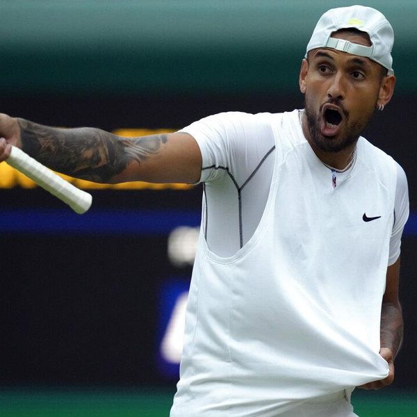 Australia's Nick Kyrgios gestures during his third round men's singles match against Greece's Stefanos Tsitsipas on day six of the Wimbledon tennis championships in London, Saturday, July 2, 2022. (AP Photo/Kirsty Wigglesworth)