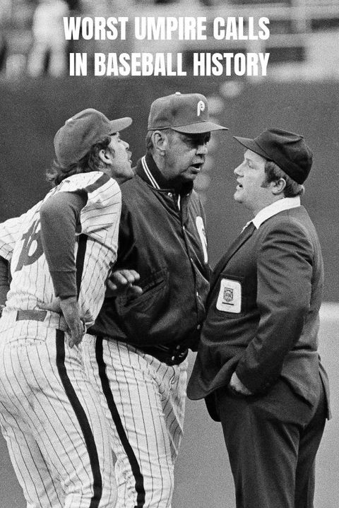 Home plate umpire Bill Miller, left, turns away from Philadelphia