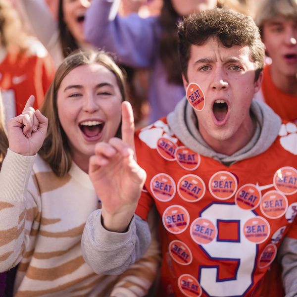 Clemson student fans cheer during an NCAA college football game against South Carolina on Saturday, Nov. 26, 2022, in Clemson, S.C. (AP Photo/Jacob Kupferman)