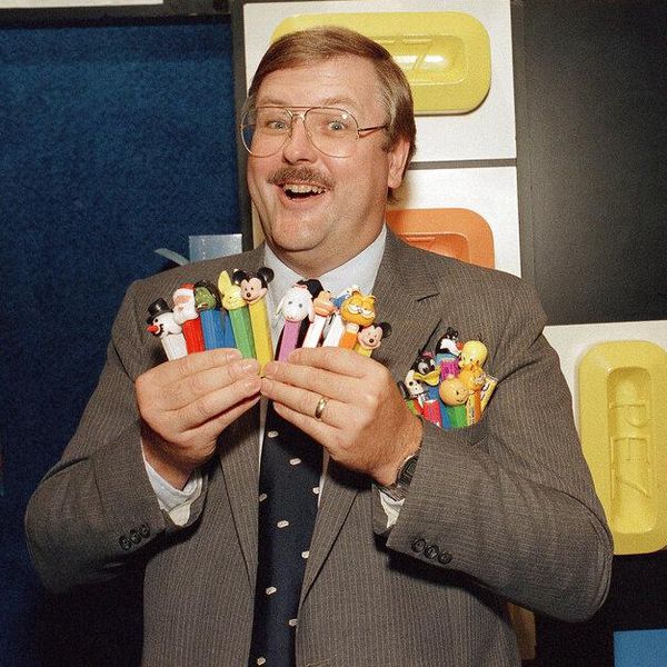 Pez Candy Co. president Scott McWhinnie shows-off the various Pez candy character dispensers on display at the Pez booth at the 43rd annual National Candy Wholesalers Assosiation convention in Boston July 29, 1988. (AP Photo/Paula Scully)