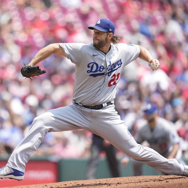 Los Angeles Dodgers starting pitcher Clayton Kershaw (22) throws in the first inning of a baseball game against the Cincinnati Reds in Cincinnati, Thursday, June 8, 2023. (AP Photo/Jeff Dean)