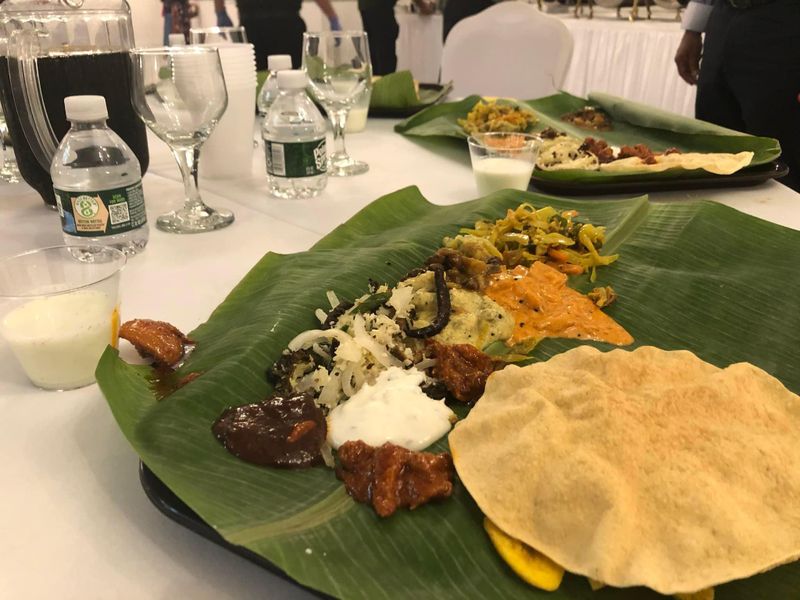 Indian food served on a banana leaf at Kochi Indian Cuisine