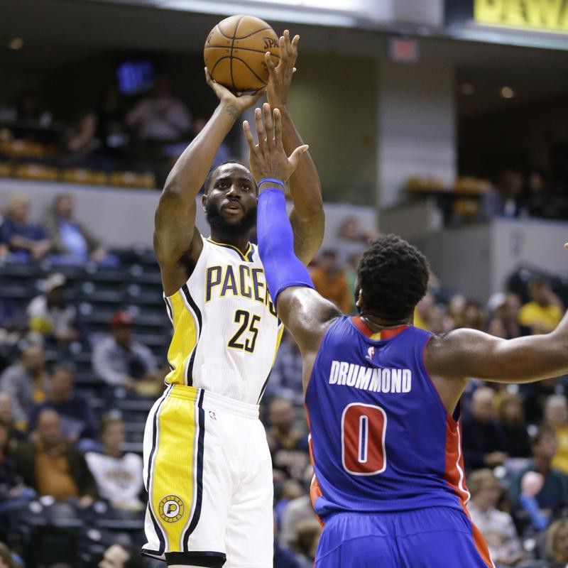 Indiana Pacers forward Rakeem Christmas shoots over Detroit Pistons center Andre Drummond