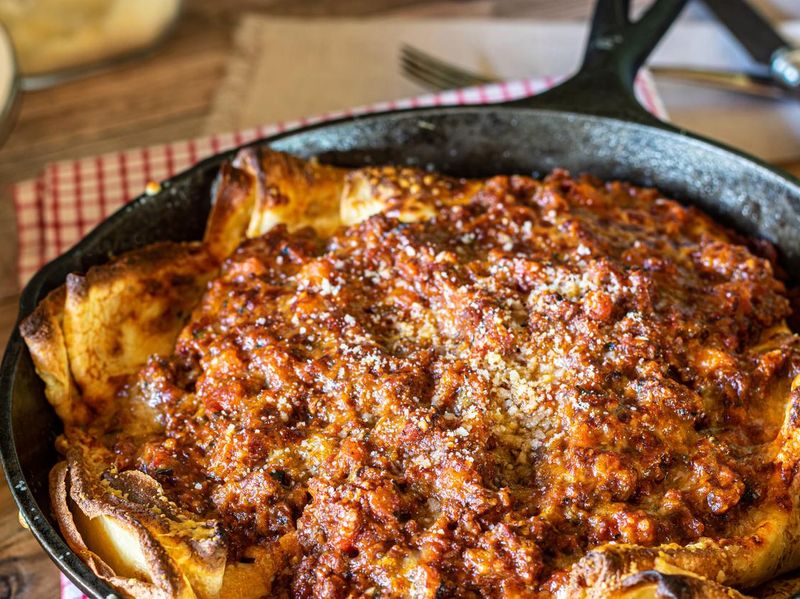 Italian dish with bolognese sauce and crespelle