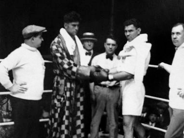 Jack Dempsey squaring off against Luis Angel Firpo