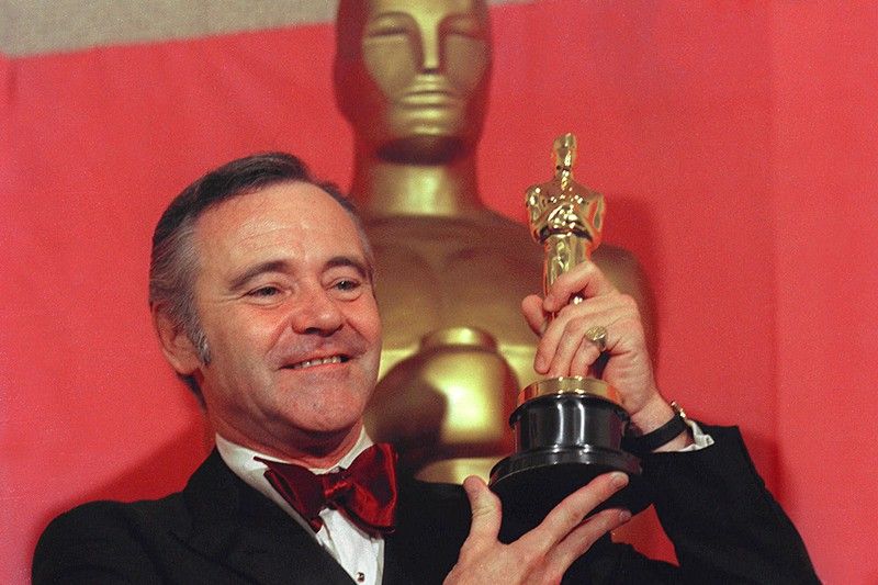 Jack Lemmon holding an Oscar