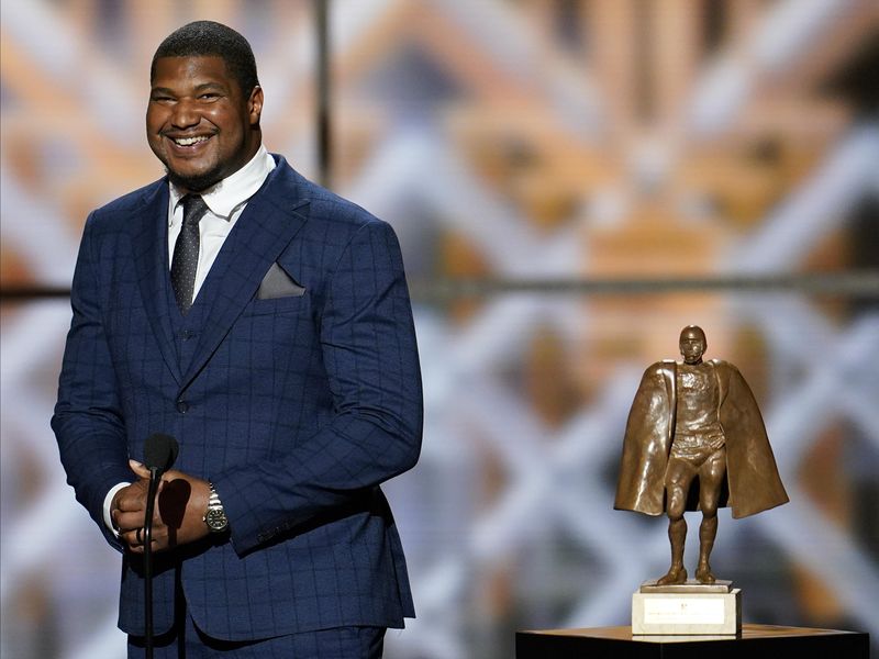 Jacksonville Jaguars' Calais Campbell speaks after winning Walter Payton NFL Man of the Year trophy