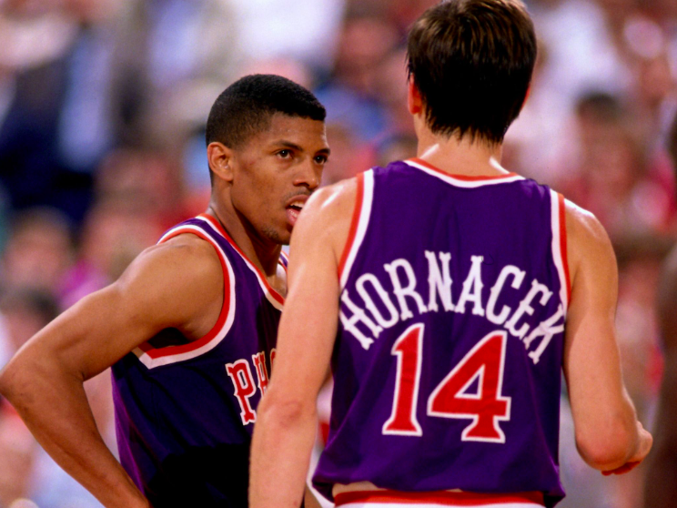 Jeff Hornacek and Kevin Johnson interacting