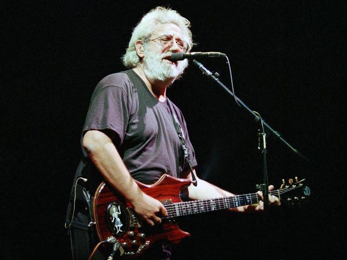 Jerry Garcia playing expensive vintage guitar