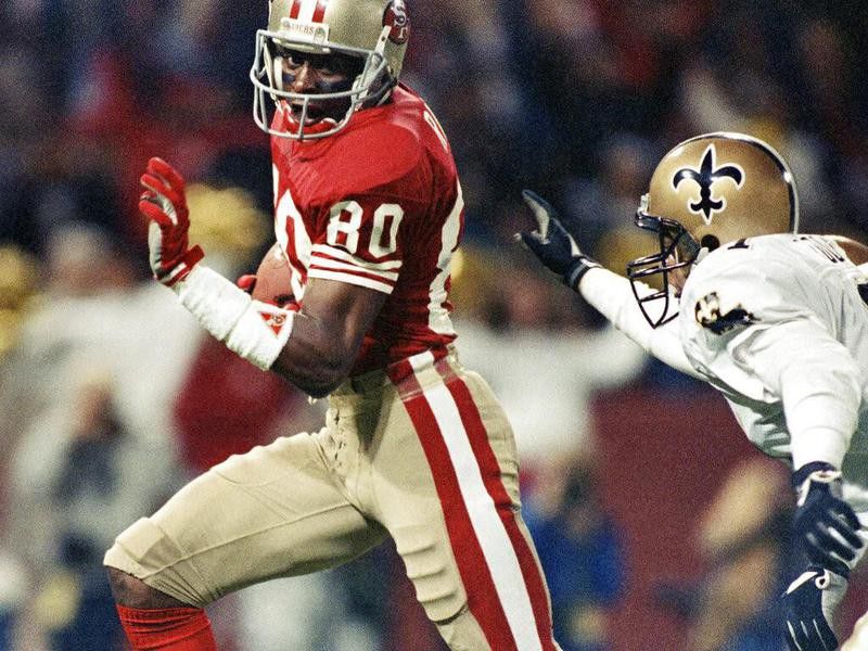 Jerry Rice running after a catch