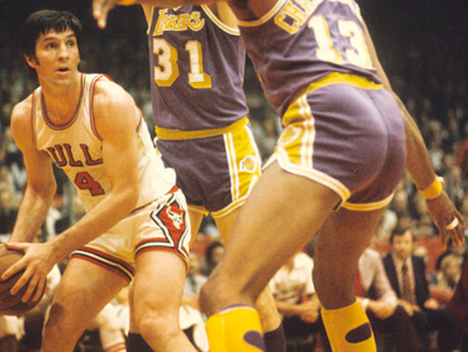 Jerry Sloan being guarded