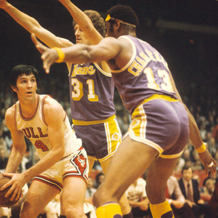 Jerry Sloan being guarded