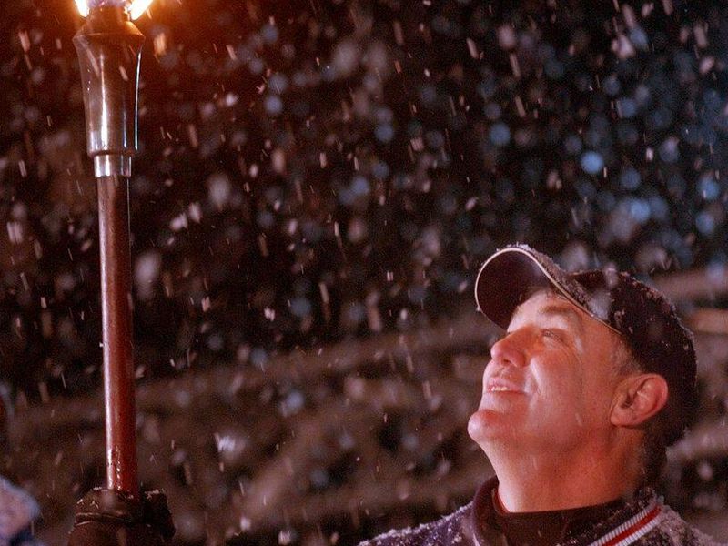 Jim Craig, in 2005, with a 1980s Olympic torch in Lake Placid