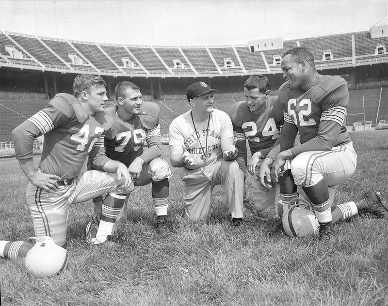 Jim Parker at Ohio State with coach Woody Hayes and teammates