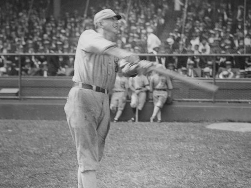 Joe Jackson swinging a bat in 1920