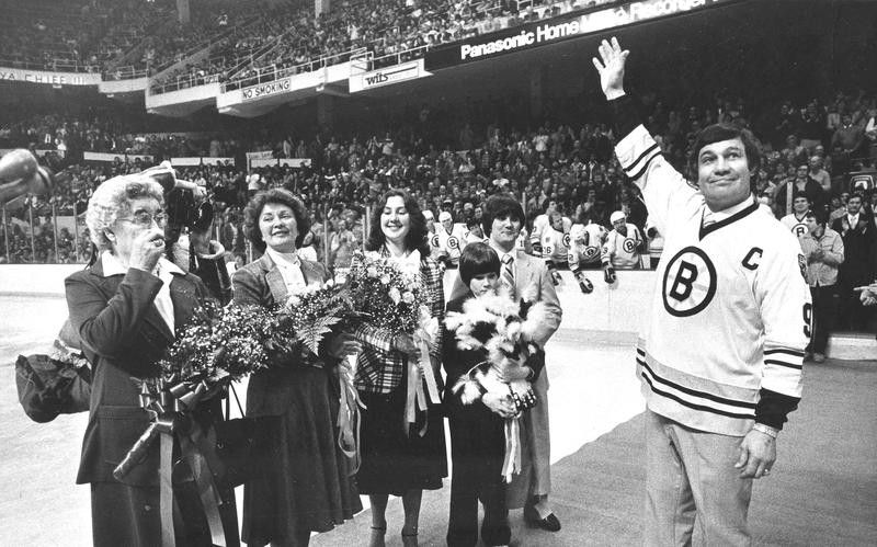 John Bucyk waves to Bruins fans after his No. 9 was retired