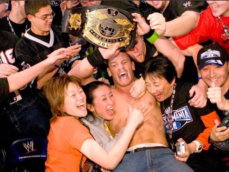 John Cena celebrates after defeating JBL