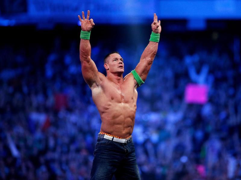 John Cena celebrates his win during Wrestlemania XXX