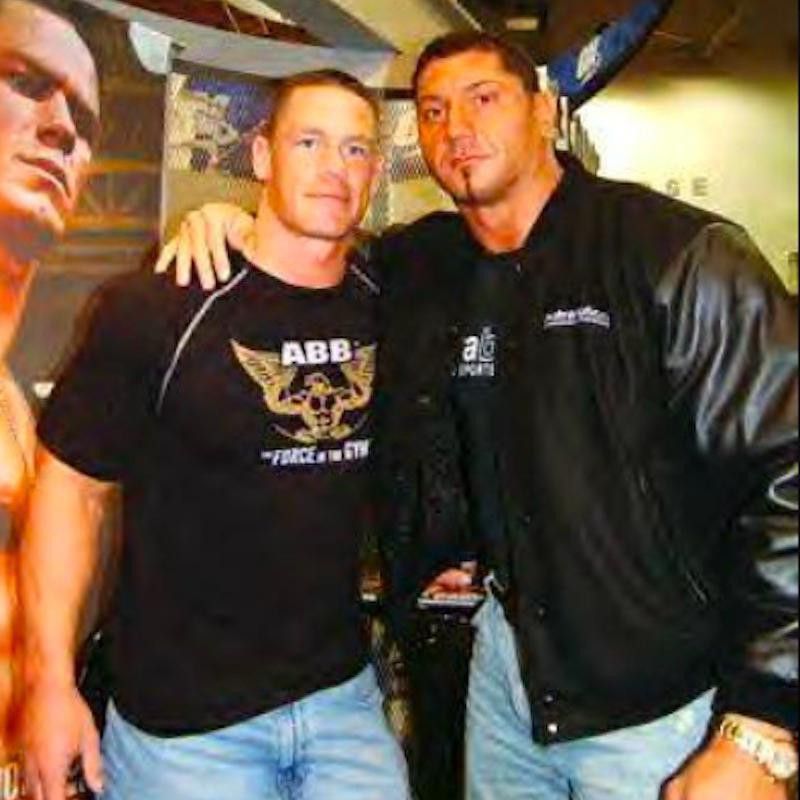 John Cena posing with Dave Bautista