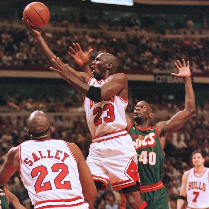 John Salley provides support to Michael Jordan against the Seattle SuperSonics