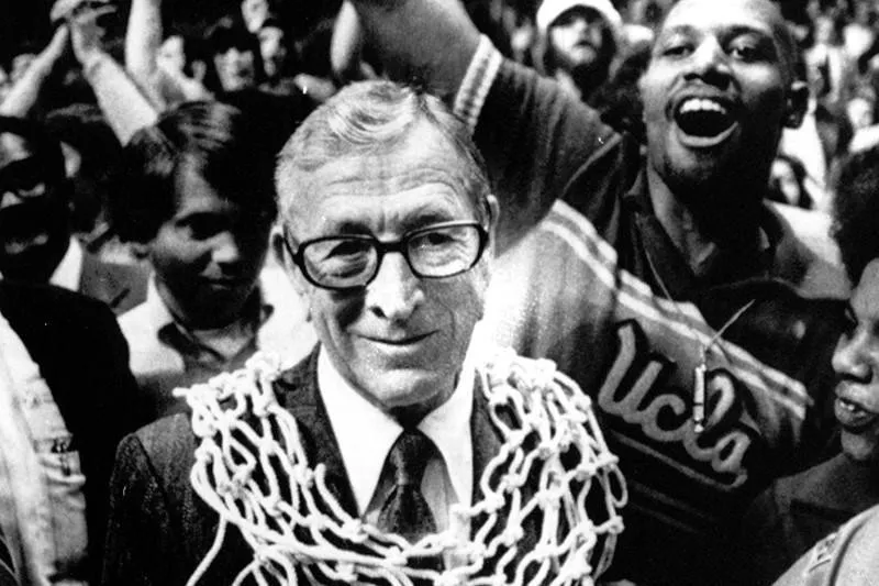 John Wooden won 664 games in his coaching career and had an .804 career winning percentage.