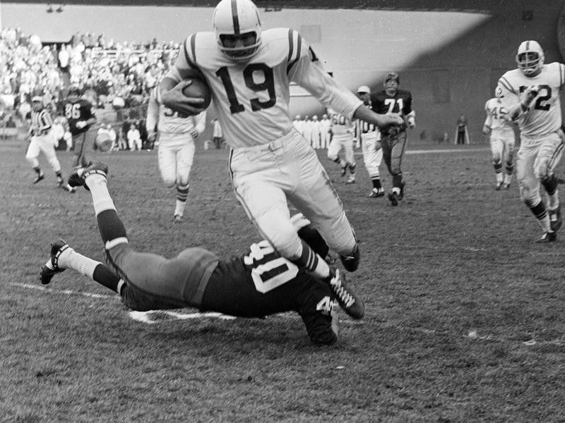 Johnny Unitas running with ball