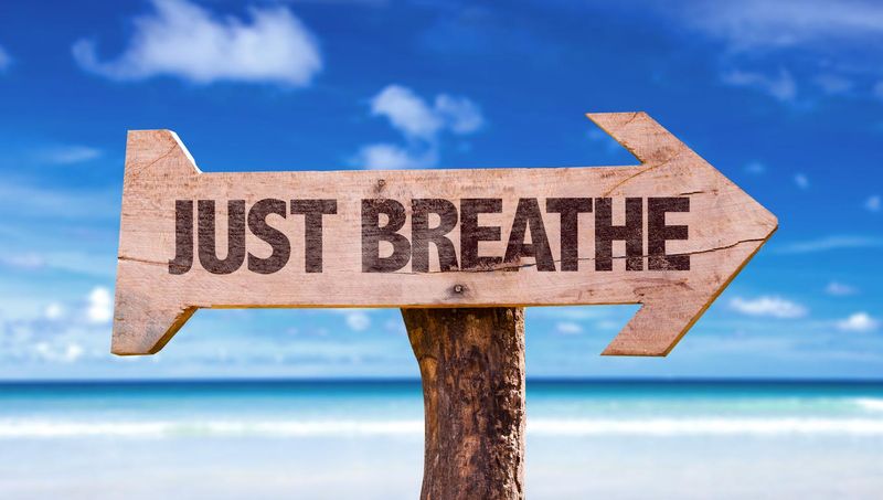 Just Breathe directional sign