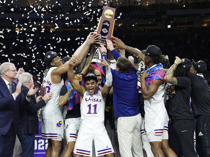 Kansas celebrates with the 2022 national championship trophy