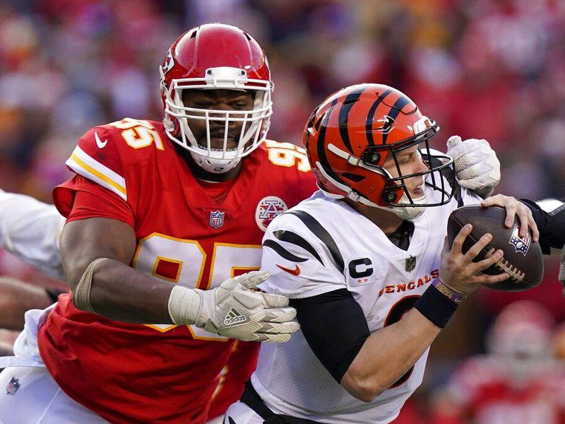 Kansas City Chiefs defensive tackle Chris Jones tackles Cincinnati Bengals quarterback Joe Burrow
