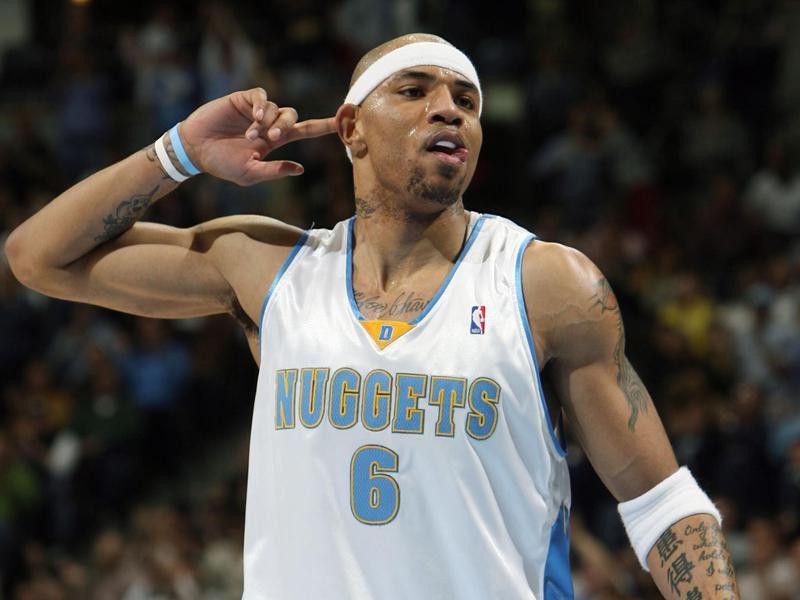 Kenyon Martin gestures to the crowd