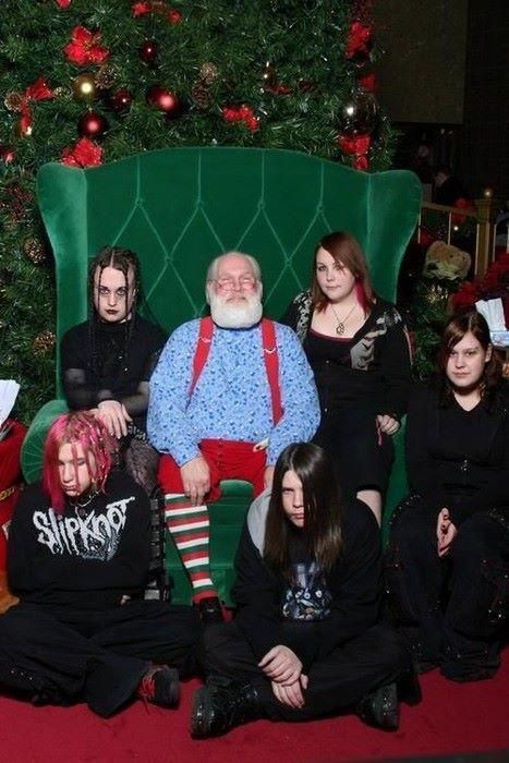 Kids dressed in black with Santa