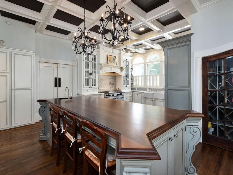 Kitchen with large center island, coffered ceiling