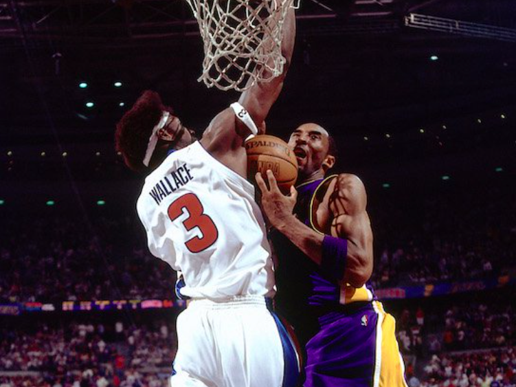 Kobe Bryant in struggle with ball against Wallace