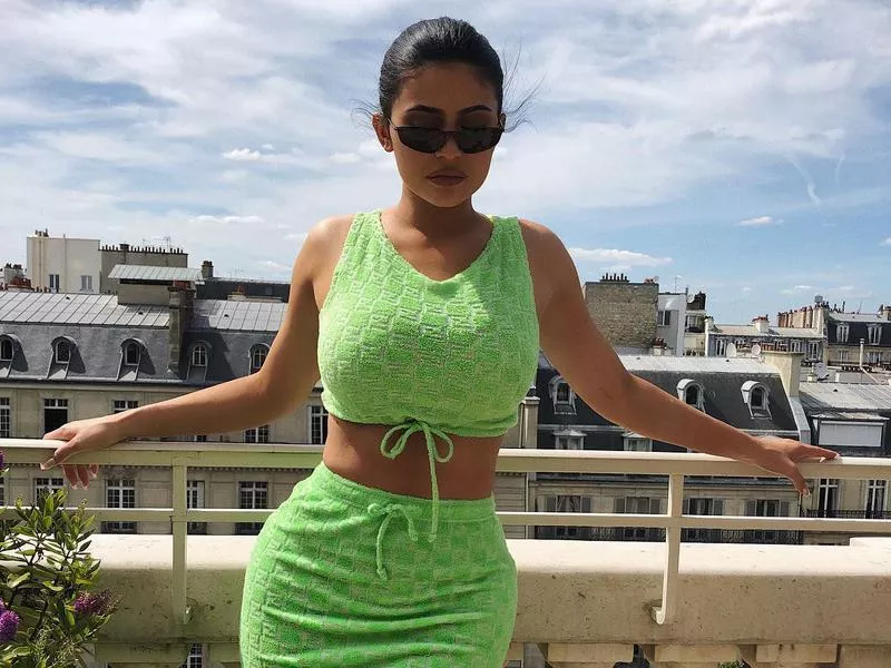 Kendall Jenner in white crop top and green skirt in Italy on