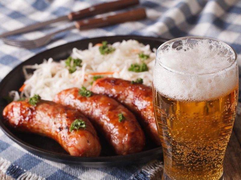 Lager beer and snacks of sausages and sauerkraut