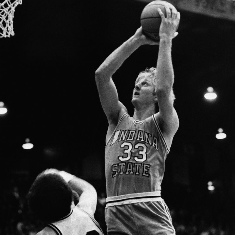 Larry Bird goes up for two points