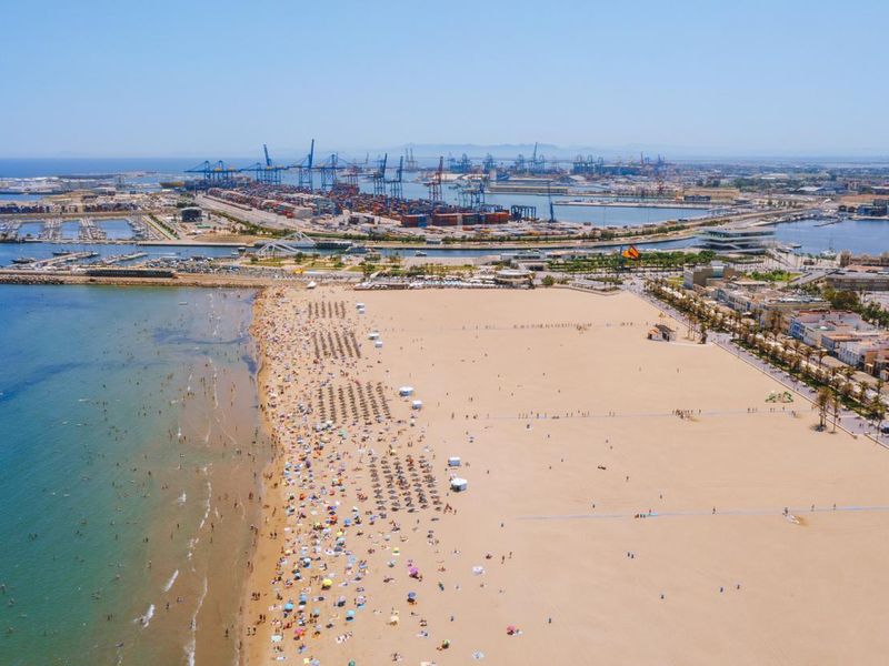 Las arenas beach and commercial docks in Valencia Spain